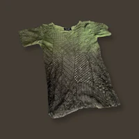 a green t - shirt on a dark background